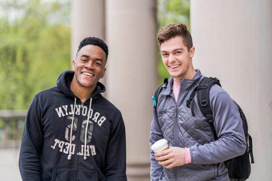 Photo of two male Chatham University students smiling